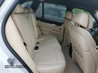 2015 BMW X5 xDrive50i z VIN 5UXKR6C5XF0J77462, wystawiony jako Copart lot #58912895 z przebiegiem 100 086 mil mil oraz Czysty tytuł • Clean title. Historia ofert i sprzedaży dostępna na DreamBid. Obrazek 11.