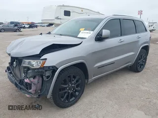 2019 Jeep Grand Cherokee Laredo E with VIN 1C4RJFAG9KC670974, listed as a IAAI auction lot 42333028 with 163,958 mi miles and . Bid and sale history available at DreamBid. Image 2.