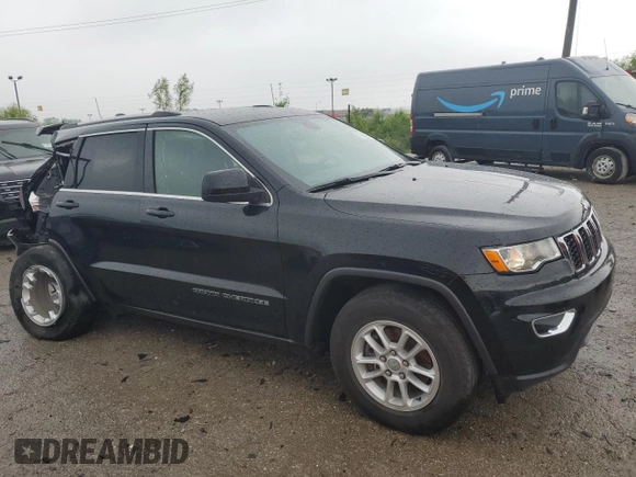 2018 Jeep Grand Cherokee Laredo E with VIN 1C4RJFAG5JC113283, listed as a Copart auction lot 57569595 with 90,897 mi miles and Salvage title. Bid and sale history available at DreamBid. Image 4.