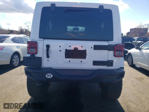 2018 Jeep Wrangler JK Unlimited Sport S with VIN 1C4BJWDG2JL913150, listed as a Copart auction lot 79956974 with 86,153 mi miles and Salvage Title. Bid and sale history available at carsss.com. Image 6.