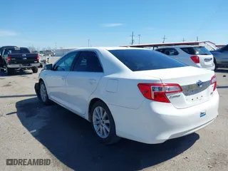 2014 Toyota Camry Hybrid LE with VIN 4T1BD1FK2EU127016, listed as a IAAI auction lot 41683491 with 173,227 mi miles. Bid and sale history available at carsss.com. Image 3.