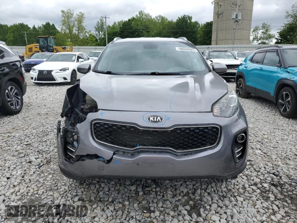 2017 Kia Sportage LX z VIN KNDPMCAC6H7183873, wystawiony jako Copart lot #58050925 z przebiegiem 116 754 mil mil oraz Czysty tytuł • Clean title. Historia ofert i sprzedaży dostępna na DreamBid. Obrazek 5.