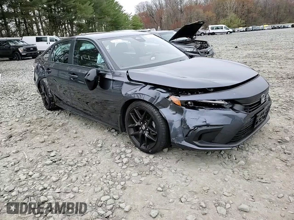 2023 Honda Civic Sport z VIN 2HGFE2F50PH556908, wystawiony jako Copart lot #52789655 z przebiegiem Nie podano mil oraz Szkoda całkowita • Salvage title. Historia ofert i sprzedaży dostępna na DreamBid. Obrazek 11.