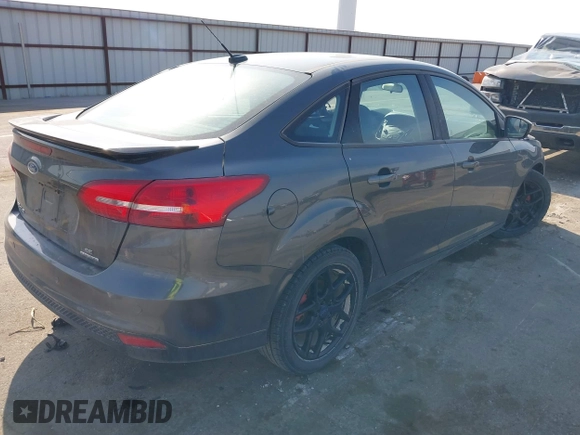 2016 Ford Focus SE with VIN 1FADP3F2XGL317130, listed as a IAAI auction lot 41970029 with 85,241 mi miles and . Bid and sale history available at DreamBid. Image 4.