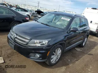 2014 Volkswagen Tiguan SE z VIN WVGAV3AX5EW609202, wystawiony jako Copart lot #50400695 z przebiegiem 113 065 mil mil oraz Czysty tytuł • Clean title. Historia ofert i sprzedaży dostępna na DreamBid. Obrazek 1.