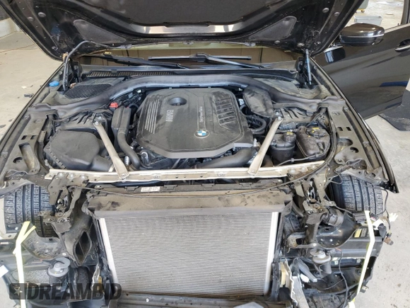 2018 BMW 5 Series 540i xDrive with VIN WBAJE7C56JWC57314, listed as a Copart auction lot 60610715 with 73,015 mi miles and Salvage title. Bid and sale history available at DreamBid. Image 11.