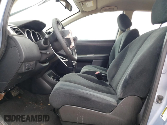 2011 Nissan Versa 1.8 S with VIN 3N1BC1CP9BL504540, listed as a Copart auction lot 69310634 with 75,726 mi miles and Salvage Title. Bid and sale history available at carsss.com. Image 7.