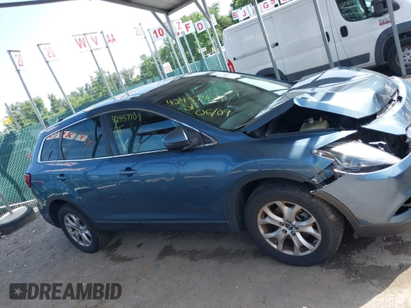 2014 Mazda CX-9 Touring with VIN JM3TB3CV7E0440747, listed as a IAAI auction lot 42457709 with 166,588 mi miles and . Bid and sale history available at DreamBid. Image 13.