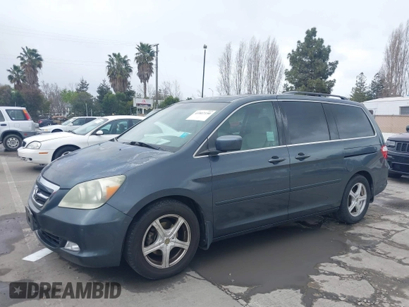 2005 Honda Odyssey TOURING with VIN 5FNRL38895B061480, listed as a IAAI auction lot 41807150 with 190,261 mi miles. Bid and sale history available at carsss.com. Image 2.