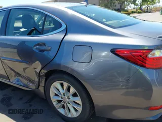 2013 Lexus ES 300h with VIN JTHBW1GG6D2033481, listed as a IAAI auction lot 42262327 with 162,138 mi miles and . Bid and sale history available at DreamBid. Image 6.
