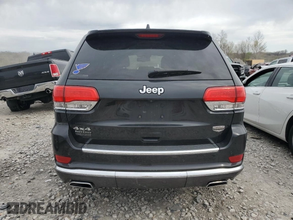 2014 Jeep Grand Cherokee Summit with VIN 1C4RJFJG1EC323658, listed as a Copart auction lot 50740115 with 253,656 mi miles and Salvage title. Bid and sale history available at DreamBid. Image 6.