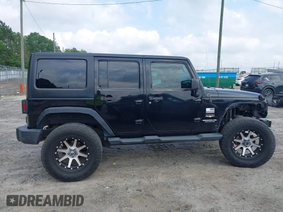 2012 Jeep Wrangler Unlimited Sahara with VIN 1C4HJWEG0CL168300, listed as a IAAI auction lot 42430678 with 70,000 mi miles and . Bid and sale history available at DreamBid. Image 14.