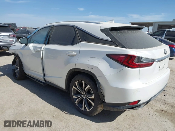 2021 Lexus RX with VIN JTJHZMDA6M2050525, listed as a IAAI auction lot 41788945 with 37,711 mi miles. Bid and sale history available at carsss.com. Image 3.