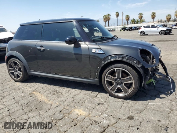 2012 MINI Hardtop S with VIN WMWSV3C53CTY29714, listed as a Copart auction lot 52370175 with 94,536 mi miles and Salvage title. Bid and sale history available at DreamBid. Image 4.