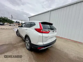 2019 Honda CR-V EX z VIN 7FARW1H50KE036985, wystawiony jako Copart lot #61110265 z przebiegiem 193 050 mil mil oraz Czysty tytuł • Clean title. Historia ofert i sprzedaży dostępna na DreamBid. Obrazek 3.
