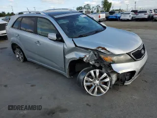 2012 Kia Sorento SX with VIN 5XYKWDA29CG302920, listed as a Copart auction lot 56237235 with 137,998 mi miles and Salvage title. Bid and sale history available at DreamBid. Image 4.