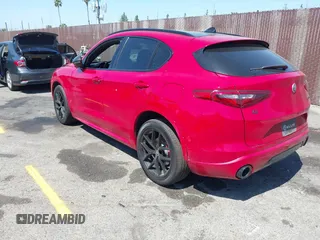 2020 Alfa Romeo Stelvio Ti z VIN ZASPAKBN5L7C73874, wystawiony jako IAAI lot #41996616 z przebiegiem Nie podano mil oraz . Historia ofert i sprzedaży dostępna na DreamBid. Obrazek 3.