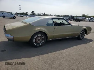1967 Oldsmobile Toronado with VIN 396877M621130, listed as a Copart auction lot 71016094 with 17,887 mi miles and Salvage Title. Bid and sale history available at DreamBid. Image 3.
