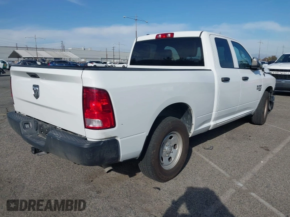 2023 Ram 1500 Tradesman with VIN 1C6RR6FG3PS593993, listed as a IAAI auction lot 41757036 with 28,654 mi miles and . Bid and sale history available at DreamBid. Image 4.