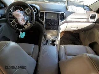 2012 Jeep Grand Cherokee Laredo with VIN 1C4RJEAG2CC215525, listed as a Copart auction lot 51876105 with 148,659 mi miles and Salvage Title. Bid and sale history available at carsss.com. Image 8.