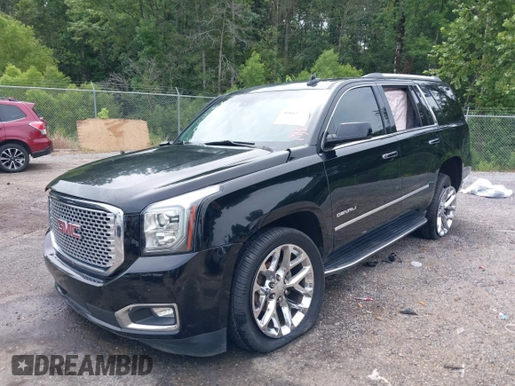 2016 GMC Yukon Denali with VIN 1GKS1CKJXGR254306, listed as a IAAI auction lot 39953539 with 164,149 mi miles. Bid and sale history available at carsss.com. Image 18.