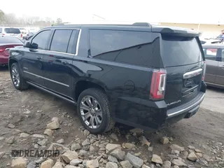 2016 GMC Yukon XL Denali with VIN 1GKS2HKJ2GR128323, listed as a IAAI auction lot 41776970 with 179,270 mi miles and . Bid and sale history available at carsss.com. Image 3.