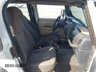 2004 Jeep Wrangler X z VIN 1J4FA39S04P747828, wystawiony jako IAAI lot #41484240 z przebiegiem Nie podano mil oraz . Historia ofert i sprzedaży dostępna na DreamBid. Obrazek 5.