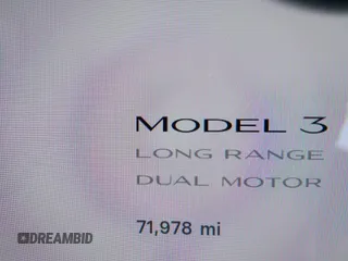 2021 Tesla Model 3 Long Range with VIN 5YJ3E1EB6MF878411, listed as a IAAI auction lot 41986947 with 71,978 mi miles and . Bid and sale history available at DreamBid. Image 16.