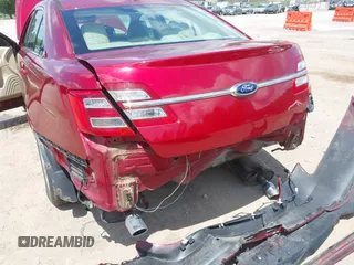 2014 Ford Taurus SEL z VIN 1FAHP2E89EG126922, wystawiony jako IAAI lot #42236235 z przebiegiem 176 917 mil mil oraz . Historia ofert i sprzedaży dostępna na DreamBid. Obrazek 6.