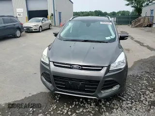 2016 Ford Escape Titanium with VIN 1FMCU9J90GUA01974, listed as a Copart auction lot 60376265 with 177,384 mi miles and Salvage title. Bid and sale history available at DreamBid. Image 14.