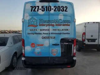 2021 Ford Transit Cargo with VIN 1FTBW3X84MKA65772, listed as a Copart auction lot 74115594 with Not Provided miles and Salvage Title. Bid and sale history available at DreamBid. Image 6.