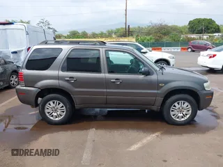 2006 Mercury Mariner Luxury with VIN 4M2YU57166KJ17723, listed as a IAAI auction lot 41818695 with 136,881 mi miles and . Bid and sale history available at DreamBid. Image 13.