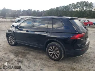 2018 Volkswagen Tiguan S with VIN 3VV1B7AXXJM105874, listed as a Copart auction lot 86565734 with 100,901 mi miles and Salvage Title. Bid and sale history available at carsss.com. Image 2.