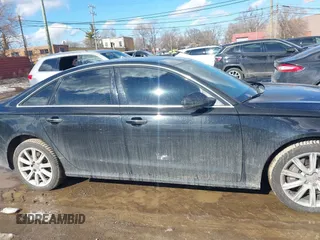 2016 Audi A6 Premium Plus z VIN WAUGFAFCXGN147215, wystawiony jako IAAI lot #41655394 z przebiegiem 143 357 mil mil oraz . Historia ofert i sprzedaży dostępna na DreamBid. Obrazek 13.
