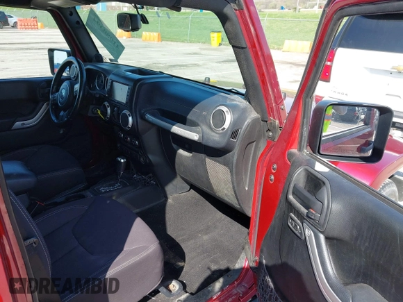 2013 Jeep Wrangler Unlimited Sahara с VIN 1C4BJWEG5DL569977, выставлен на аукционе IAAI как лот 41980394 с пробегом 145 571 миль миль и . История ставок и продаж доступна на DreamBid. Изображение 5.