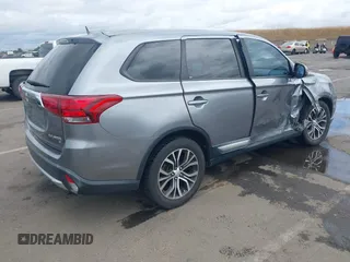 2018 Mitsubishi Outlander SE with VIN JA4AD3A31JZ016055, listed as a IAAI auction lot 42245714 with 97,448 mi miles and . Bid and sale history available at DreamBid. Image 4.