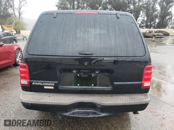 2001 Ford Explorer Sport z VIN 1FMYU60E11UC18170, wystawiony jako Copart lot #49212385 z przebiegiem 219 383 mil mil oraz Tytuł czysty. Historia ofert i sprzedaży dostępna na DreamBid. Obrazek 6.