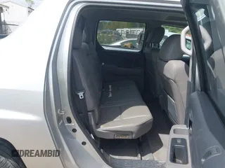 2014 Honda Ridgeline RTL with VIN 5FPYK1F53EB013752, listed as a IAAI auction lot 41886851 with 89,038 mi miles and . Bid and sale history available at DreamBid. Image 8.
