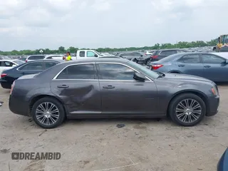 2014 Chrysler 300 S with VIN 2C3CCAGG5EH201509, listed as a IAAI auction lot 42292680 with 162,674 mi miles and . Bid and sale history available at DreamBid. Image 13.