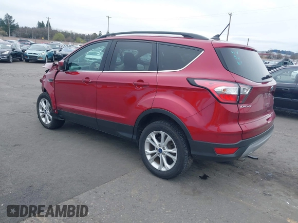 2018 Ford Escape SE z VIN 1FMCU9GD8JUB14803, wystawiony jako IAAI lot #41842056 z przebiegiem 50 712 mil mil oraz . Historia ofert i sprzedaży dostępna na DreamBid. Obrazek 3.