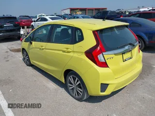 2015 Honda Fit EX-L z VIN 3HGGK5H84FM717976, wystawiony jako IAAI lot #42451573 z przebiegiem 110 963 mil mil oraz . Historia ofert i sprzedaży dostępna na DreamBid. Obrazek 3.