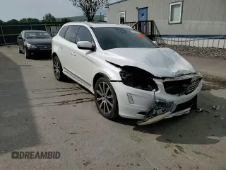 2015 Volvo XC60 T6 Platinum с VIN YV4902RM5F2701166, выставлен на аукционе Copart как лот 57146735 с пробегом 156 235 миль миль и Списание • Salvage title. История ставок и продаж доступна на DreamBid. Изображение 14.