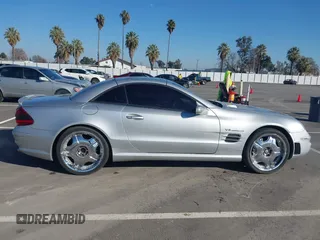 2004 Mercedes-Benz SL 55/63 AMG z VIN WDBSK74F14F076497, wystawiony jako IAAI lot #41285216 z przebiegiem 146 160 mil mil oraz . Historia ofert i sprzedaży dostępna na DreamBid. Obrazek 13.