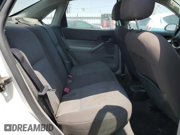 2007 Ford Focus S z VIN 1FAFP34NX7W106482, wystawiony jako Copart lot #57675245 z przebiegiem 170 237 mil mil oraz Szkoda całkowita • Salvage title. Historia ofert i sprzedaży dostępna na DreamBid. Obrazek 10.