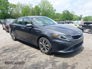 2019 Kia Optima LX z VIN 5XXGT4L32KG298796, wystawiony jako IAAI lot #42266827 z przebiegiem 89 841 mil mil oraz . Historia ofert i sprzedaży dostępna na DreamBid. Obrazek 1.