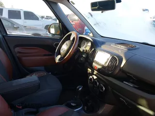 2014 FIAT 500L Trekking with VIN ZFBCFADHXEZ018139, listed as a IAAI auction lot 41224953 with 175,727 mi miles and . Bid and sale history available at DreamBid. Image 5.