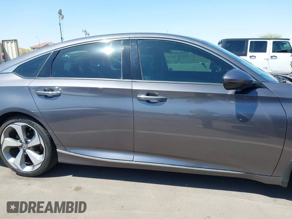 2019 Honda Accord Touring with VIN 1HGCV2F92KA004825, listed as a IAAI auction lot 41974555 with 74,464 mi miles and . Bid and sale history available at DreamBid. Image 13.