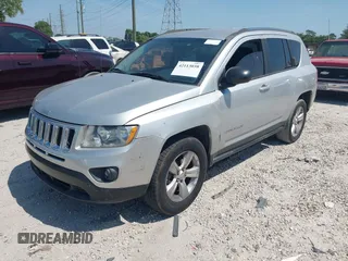 2012 Jeep Compass Sport with VIN 1C4NJCBA7CD660091, listed as a IAAI auction lot 42113038 with 123,181 mi miles. Bid and sale history available at carsss.com. Image 2.