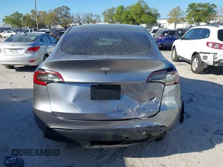 2025 Tesla Model Y Long Range with VIN 7SAYGDED7SA376233, listed as a IAAI auction lot 41777876 with 70 mi miles and . Bid and sale history available at DreamBid. Image 16.