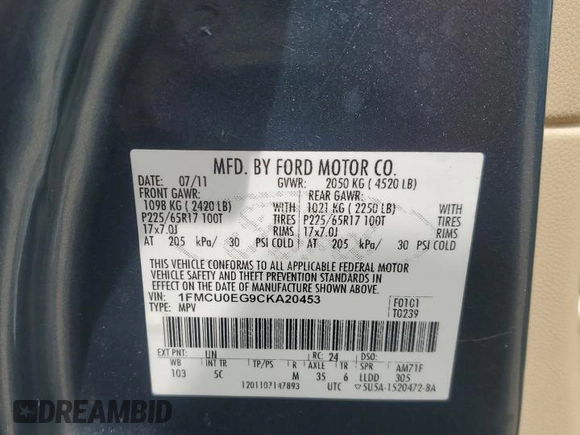 2012 Ford Escape Limited z VIN 1FMCU0EG9CKA20453, wystawiony jako Copart lot #56009755 z przebiegiem 190 000 mil mil oraz Szkoda całkowita • Salvage title. Historia ofert i sprzedaży dostępna na DreamBid. Obrazek 14.